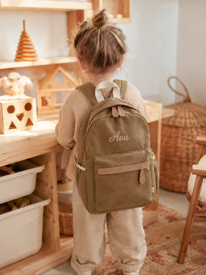 Welcomenest personalised backpack worn by child, khaki, name Ava