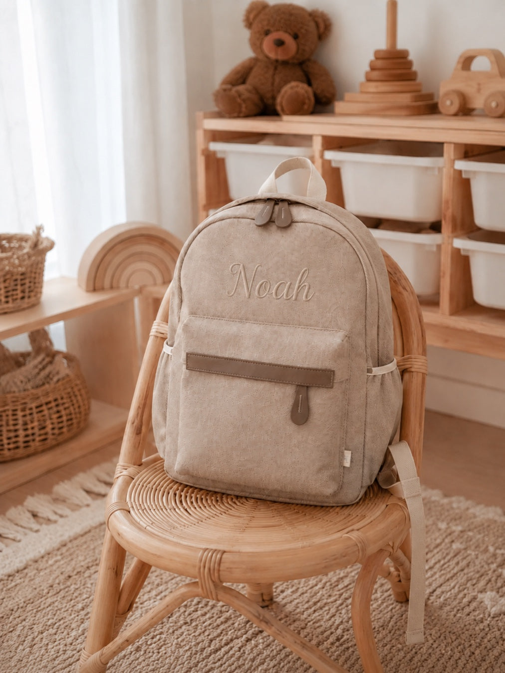 Welcomenest herringbone personalised backpack on rattan chair, name Noah